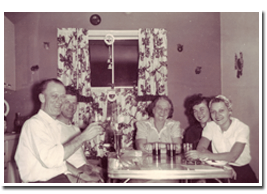 Reds and Anne Baker with family friends, circa 1954